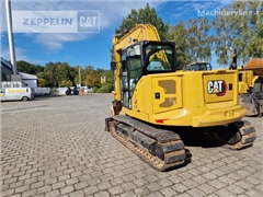 Minikoparka Caterpillar 310