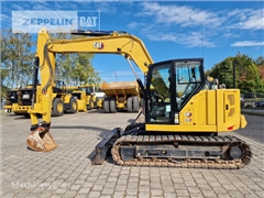 Minikoparka Caterpillar 310