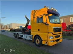 MAN TGX 28.480 haakarm HYVA 26 ton , voor 7 plus bakke