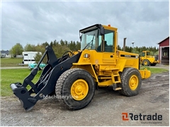 Sprzedam ładowarka kołowa Volvo L90C poprzez aukcj