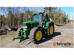 Sprzedam ciągnik kołowy John Deere 6430 poprzez au